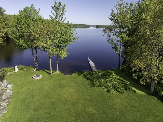 1824 Sunny Cove Ln, Meddybemps, ME 04657 - dock area featuring a water view, a yard, and an outdoor fire pit