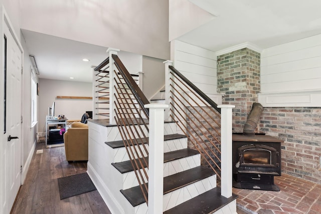 430 Old Bath Rd, Wiscasset, ME 04578 - stairs with a wood stove, recessed lighting, and baseboards