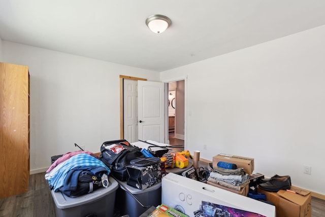 430 Old Bath Rd, Wiscasset, ME 04578 - bedroom featuring wood finished floors, baseboards, and a closet
