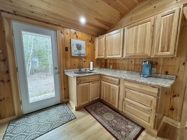 53 Pigeon Rd, Fletchers Landing Twp, ME 04605 - kitchen with lofted ceiling, light wood-type flooring, wooden walls, light brown cabinetry, and wood ceiling