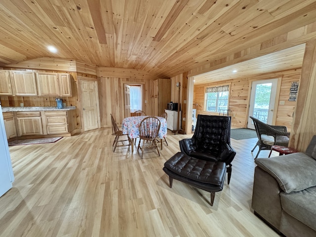 53 Pigeon Rd, Fletchers Landing Twp, ME 04605 - dining space with light wood-type flooring, wood walls, recessed lighting, and wooden ceiling