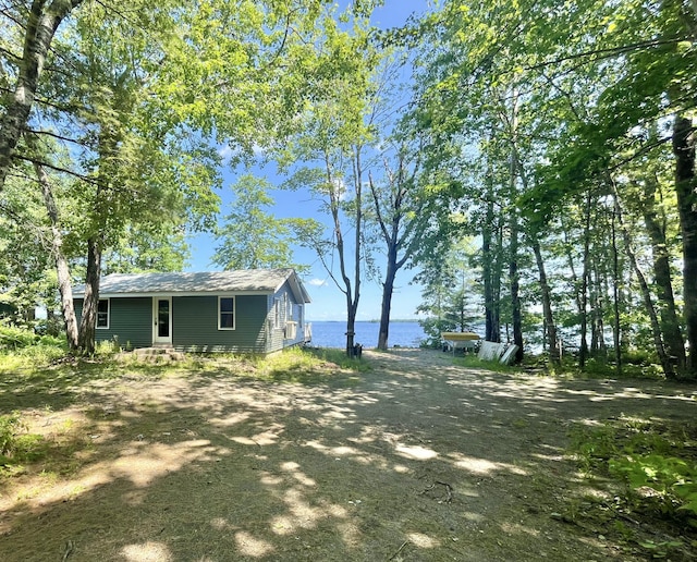 53 Pigeon Rd, Fletchers Landing Twp, ME 04605 - view of yard featuring a water view and entry steps