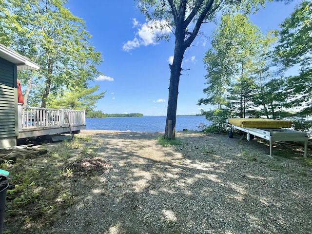 53 Pigeon Rd, Fletchers Landing Twp, ME 04605 - view of yard featuring a deck with water view