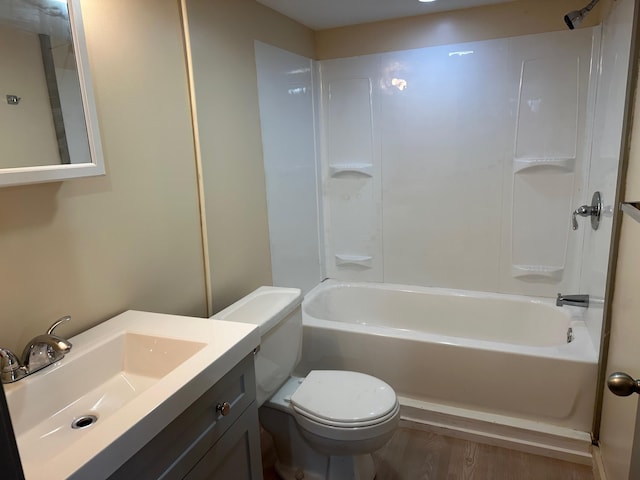 72 Seal Cove Rd, Southwest Harbor, ME 04679 - full bath featuring toilet, bathtub / shower combination, wood finished floors, and vanity