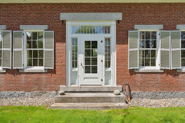 538 Malbons Mills Rd, Skowhegan, ME 04976 - view of exterior entry with brick siding