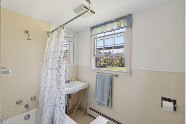 538 Malbons Mills Rd, Skowhegan, ME 04976 - bathroom with shower / tub combo with curtain and a baseboard radiator