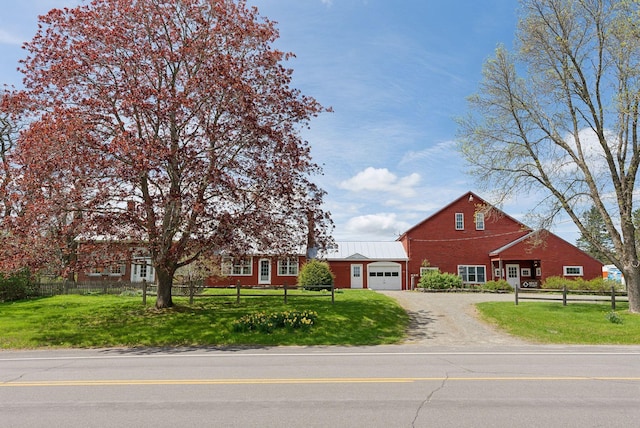 538 Malbons Mills Rd, Skowhegan, ME 04976 - view of front of property featuring a garage and dirt driveway