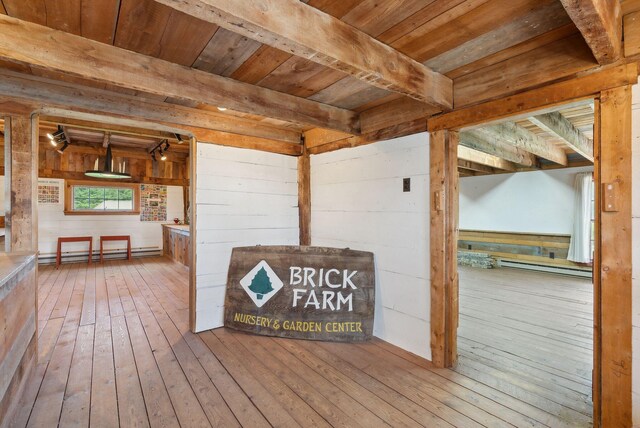 538 Malbons Mills Rd, Skowhegan, ME 04976 - wooden deck with a baseboard heating unit