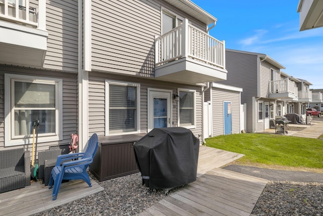 15 Francis St Unit 10, Old Orchard Beach, ME 04064 - wooden deck with a grill, a patio area, and a yard