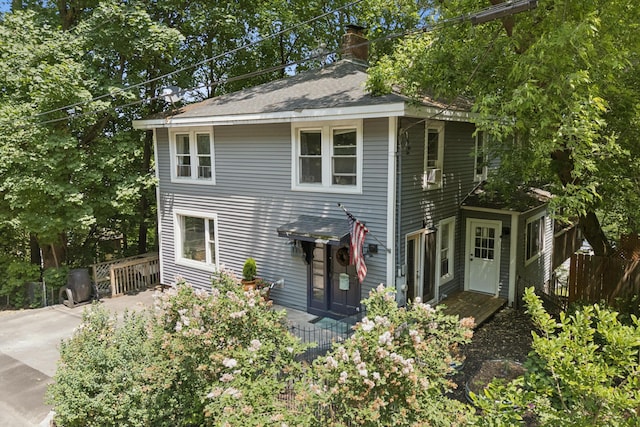 176 Second St, Auburn, ME 04210 - view of front of house with a chimney and cooling unit