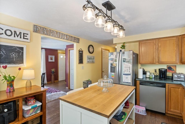 212 New Dam Rd, Waterboro, ME 04061 - kitchen featuring stainless steel appliances, dark wood-style floors, wooden counters, a center island, and open shelves