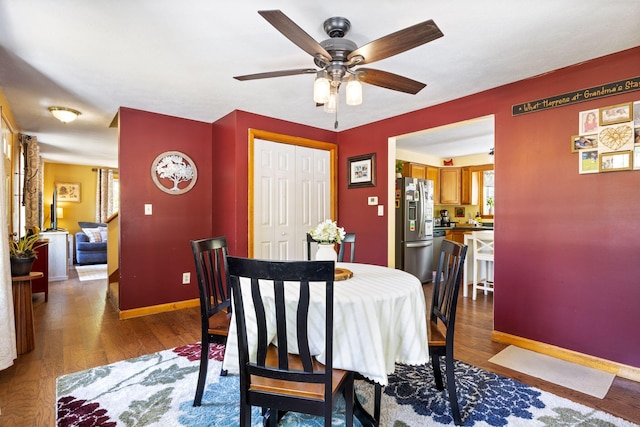 212 New Dam Rd, Waterboro, ME 04061 - dining space featuring ceiling fan, wood finished floors, and baseboards
