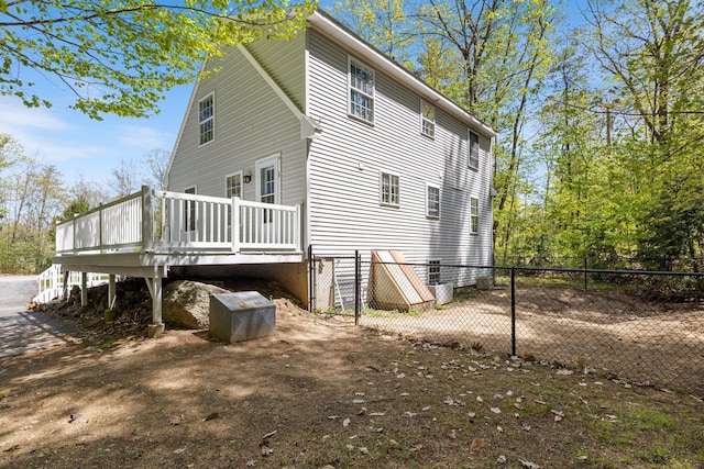212 New Dam Rd, Waterboro, ME 04061 - view of side of home featuring a wooden deck and fence
