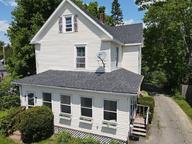 19 Russell St, Bangor, ME 04401 - view of property exterior with roof with shingles, a chimney, and a wooden deck