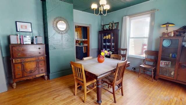 19 Russell St, Bangor, ME 04401 - dining space with hardwood / wood-style floors, a chandelier, and ornamental molding