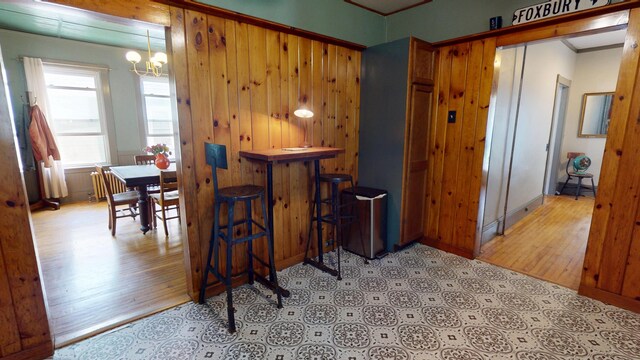 19 Russell St, Bangor, ME 04401 - dining space featuring ornamental molding, a chandelier, and wood finished floors