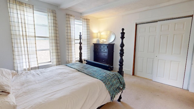 19 Russell St, Bangor, ME 04401 - carpeted bedroom with beam ceiling and a closet