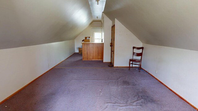 19 Russell St, Bangor, ME 04401 - additional living space featuring lofted ceiling, baseboards, and carpet flooring