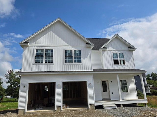 LOT3 Hawks Xing, Hermon, ME 04401 - modern farmhouse with covered porch, a garage, driveway, and a shingled roof
