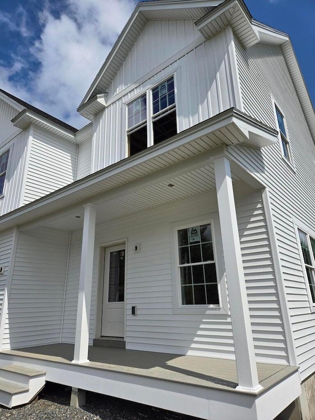 LOT3 Hawks Xing, Hermon, ME 04401 - view of home's exterior with covered porch and board and batten siding