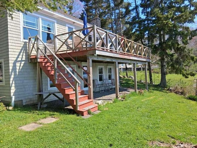 21 Linekin Rd, Boothbay Harbor, ME 04538 - back of house with a chimney, a deck, a lawn, and stairway