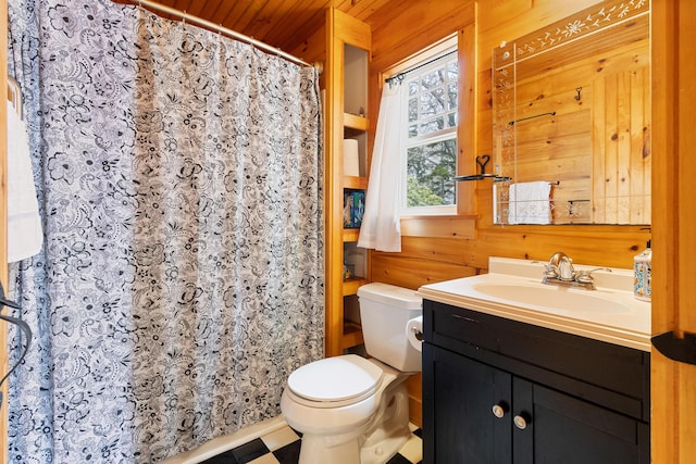 21 Linekin Rd, Boothbay Harbor, ME 04538 - full bath with wooden walls, toilet, vanity, and a shower with curtain