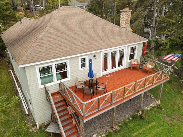 21 Linekin Rd, Boothbay Harbor, ME 04538 - back of property with a shingled roof, a wooden deck, a chimney, stairway, and french doors