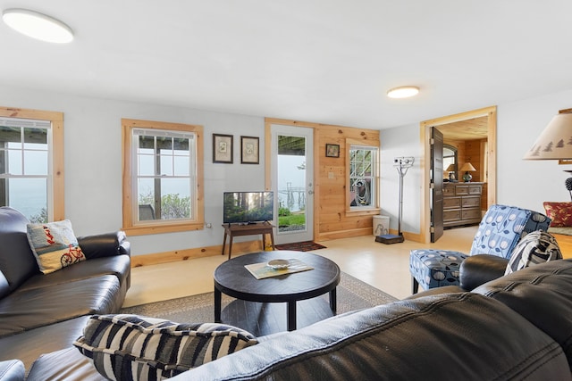 21 Linekin Rd, Boothbay Harbor, ME 04538 - living room with healthy amount of natural light and wood walls
