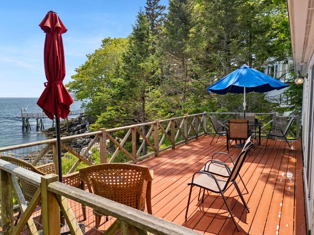21 Linekin Rd, Boothbay Harbor, ME 04538 - wooden terrace with a water view and outdoor dining space