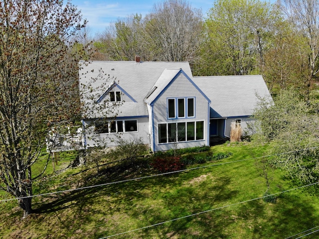 17 Westview Rd, Damariscotta, ME 04543 - rear view of house featuring a yard and a chimney