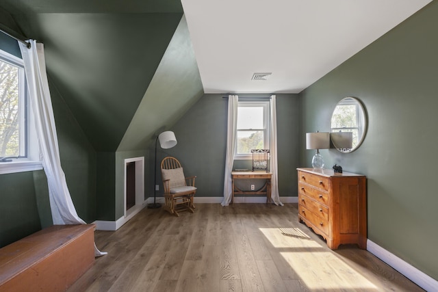 17 Westview Rd, Damariscotta, ME 04543 - living area featuring light wood-type flooring, vaulted ceiling, and baseboards