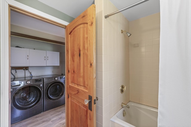 17 Westview Rd, Damariscotta, ME 04543 - full bath featuring independent washer and dryer, wood finished floors, and shower / bath combo