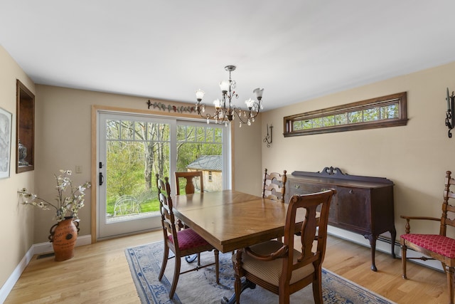 17 Westview Rd, Damariscotta, ME 04543 - dining space with a chandelier, healthy amount of natural light, and light wood finished floors