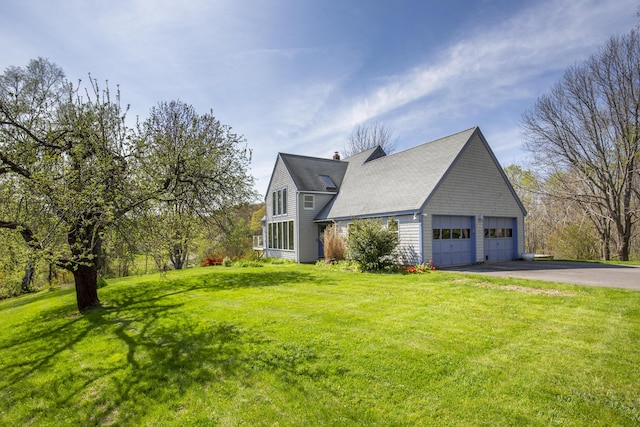17 Westview Rd, Damariscotta, ME 04543 - view of property exterior featuring asphalt driveway and a lawn