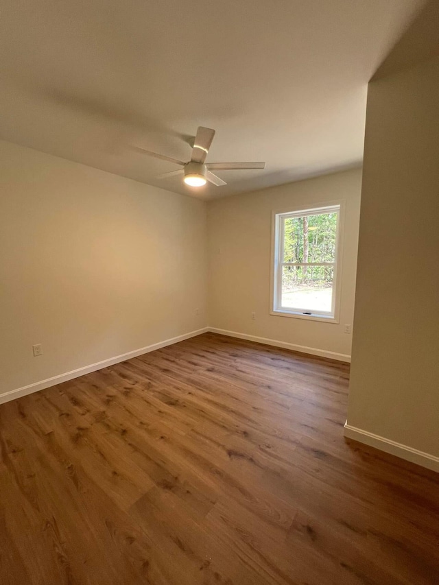 29 Sunnybrook Farm Rd, Bridgton, ME 04009 - spare room featuring wood finished floors, baseboards, and a ceiling fan