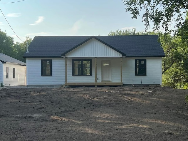 29 Sunnybrook Farm Rd, Bridgton, ME 04009 - view of front facade with covered porch and roof with shingles