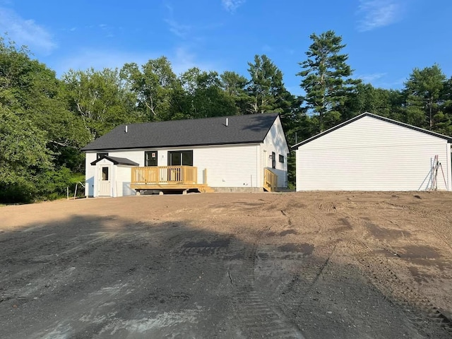 29 Sunnybrook Farm Rd, Bridgton, ME 04009 - view of front of property featuring a deck and view of wooded area