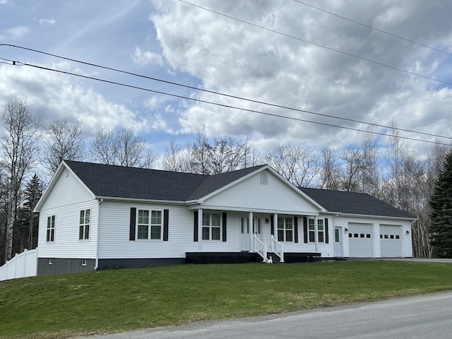 56 Solar Dr, Caribou, ME 04736 - view of front of home with covered porch, a garage, a front yard, and a shingled roof