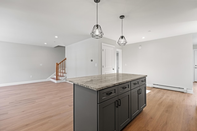 32 Jackson St, Portland, ME 04103 - kitchen featuring a baseboard radiator, light wood-type flooring, a kitchen island, hanging light fixtures, and recessed lighting