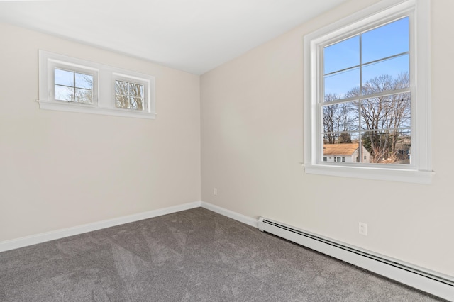 32 Jackson St, Portland, ME 04103 - carpeted empty room featuring a baseboard heating unit, healthy amount of natural light, and baseboards