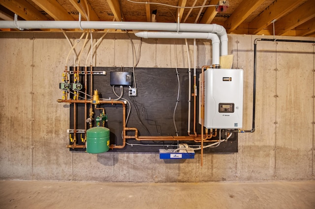 32 Jackson St, Portland, ME 04103 - utility room featuring water heater