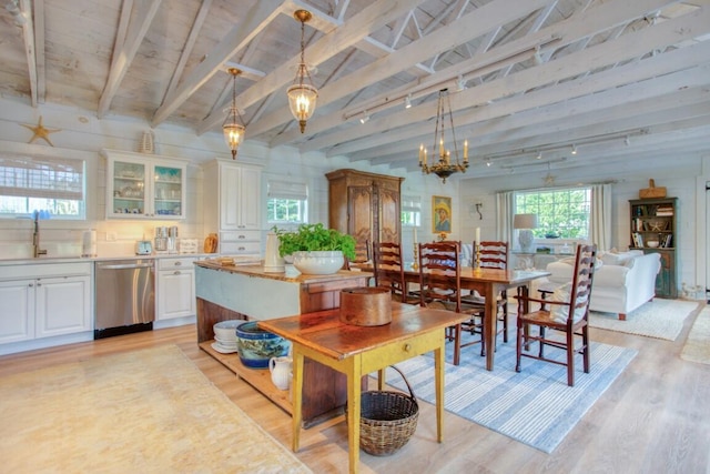 32 Murray Hill Rd, Boothbay, ME 04544 - dining space featuring light wood finished floors and rail lighting