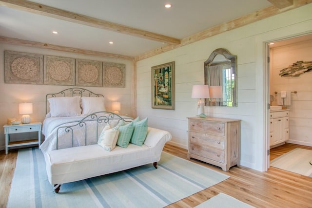 32 Murray Hill Rd, Boothbay, ME 04544 - bedroom featuring beam ceiling, light wood finished floors, ensuite bath, recessed lighting, and baseboards