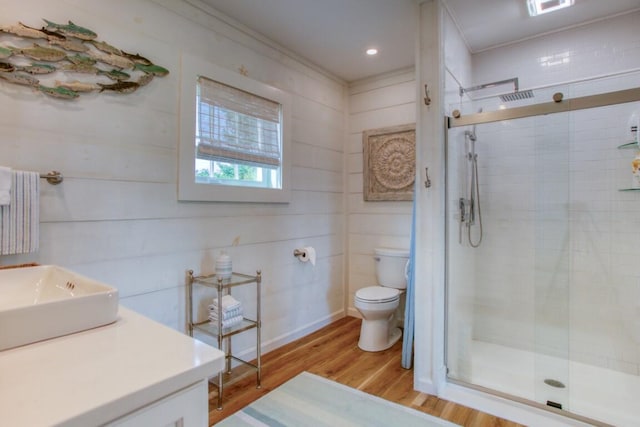32 Murray Hill Rd, Boothbay, ME 04544 - bathroom with wood finished floors, toilet, a shower stall, and recessed lighting