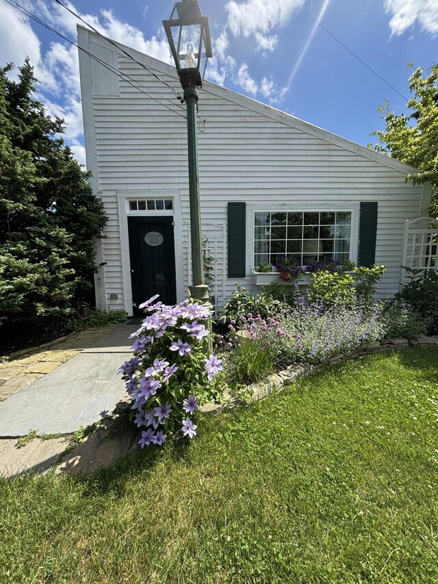 32 Murray Hill Rd, Boothbay, ME 04544 - view of property exterior with a lawn