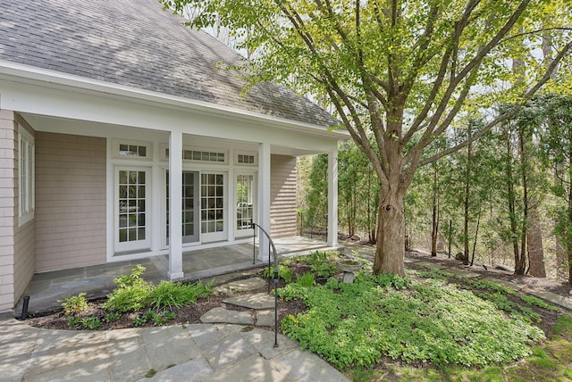 11 Clubhouse Dr, Kennebunk, ME 04043 - entrance to property with a shingled roof and a porch