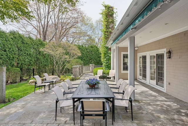 11 Clubhouse Dr, Kennebunk, ME 04043 - view of patio featuring a fenced backyard and outdoor dining area