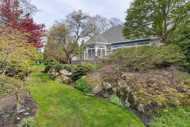 11 Clubhouse Dr, Kennebunk, ME 04043 - view of green lawn with a wooden deck