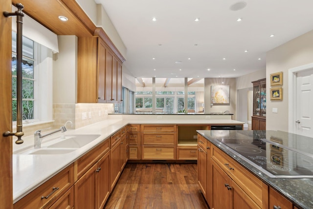11 Clubhouse Dr, Kennebunk, ME 04043 - kitchen featuring a sink, black electric cooktop, recessed lighting, dark wood finished floors, and a peninsula