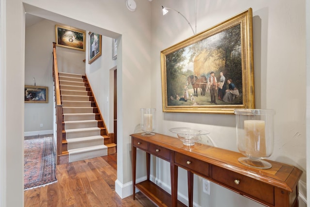 11 Clubhouse Dr, Kennebunk, ME 04043 - stairs featuring wood finished floors and baseboards